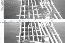 Building the original plant wharf in 1954, Joe Casey on the pile driver.