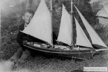 Ernie Walsh and his prized boat built by his brother John.